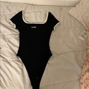 Black and white bodysuit. Brand new!